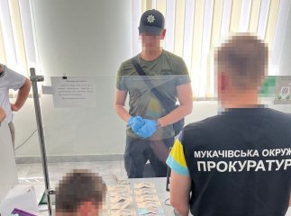 Судитимуть посадовців, які організували схему одержання посвідчення водія за хабар