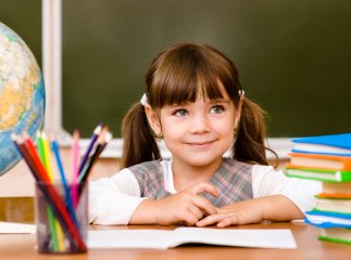 Одяг, портфель та канцтовари: скільки коштує зібрати першачка