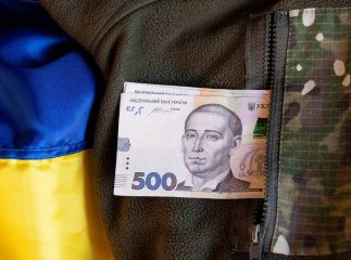 Хто з військових має право на підйому допомогу в розмірі 100% грошового забезпечення