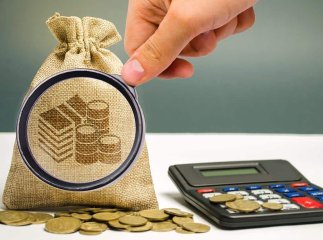Податки у 2022 році для частини українців зростуть: хто заплатить більше