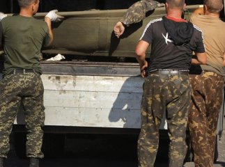 Місія "Чорни тюльпан" доставляє тіло загиблого в зоні АТО закарпатця додому