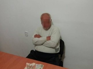 На Берегівщині поліція та СБУ піймали сільського голову на хабарі