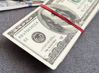 Обмін 100 доларів