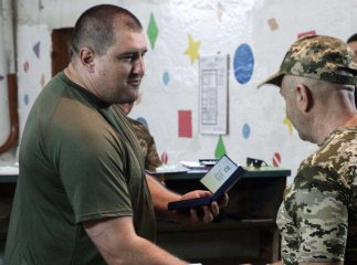 Командир 128 бригади вручив воїнам нагороди, відзнаки й чергові звання