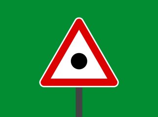 Що означає дорожній знак крапка в трикутнику, який встановлюють в Україні