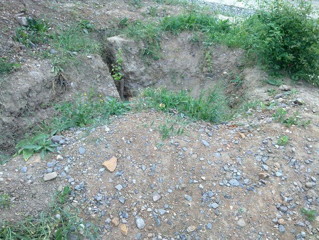 Будівельники розрили зелену зону по вулиці Осипенка та забули за неї (ФОТО) – 06