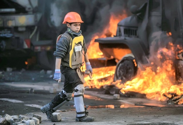 24 січня, дитина на Грушевського. Фото Reuters
